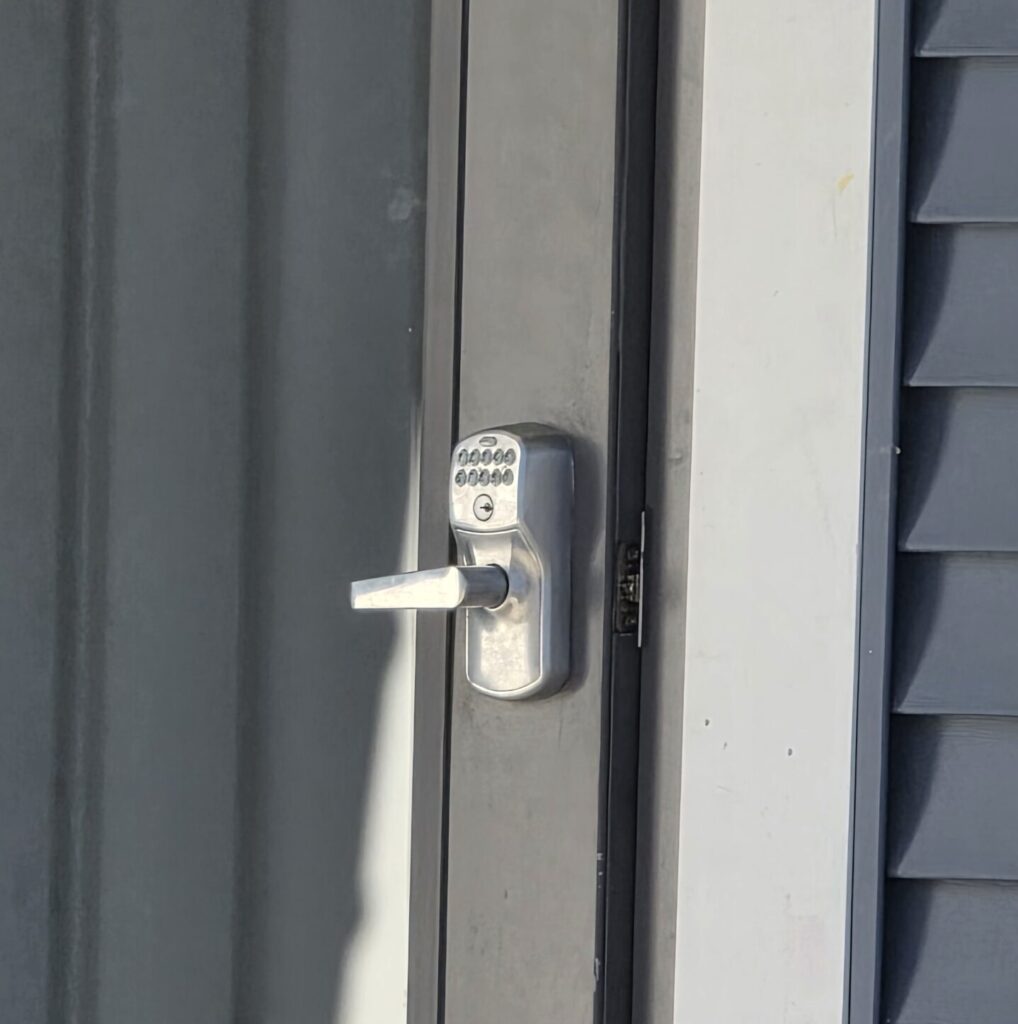 Photo displaying a door cracked open. One thing you can do to improve home safety is to close your door.